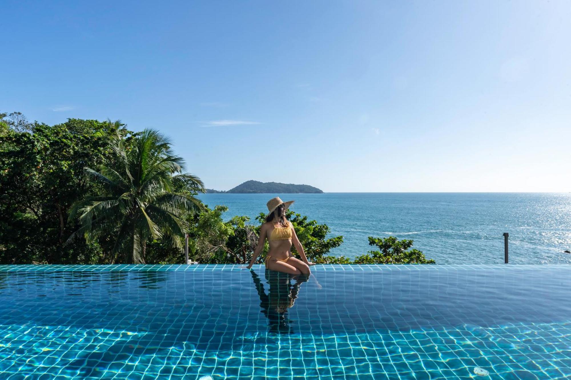 Zenmaya Oceanfront Phuket, Trademark Collection By Wyndham Patong Exterior photo Infinity pool at a resort in Thailand